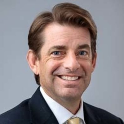 Headshot of John Roman