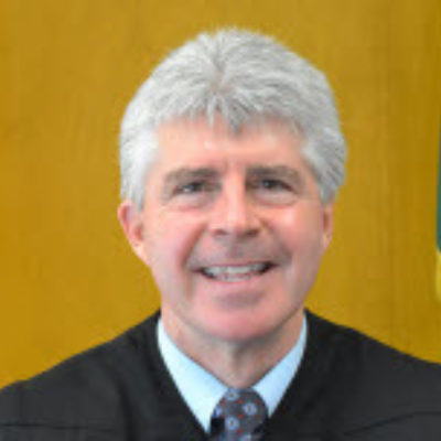 Headshot of Judge Stan Rumbaugh